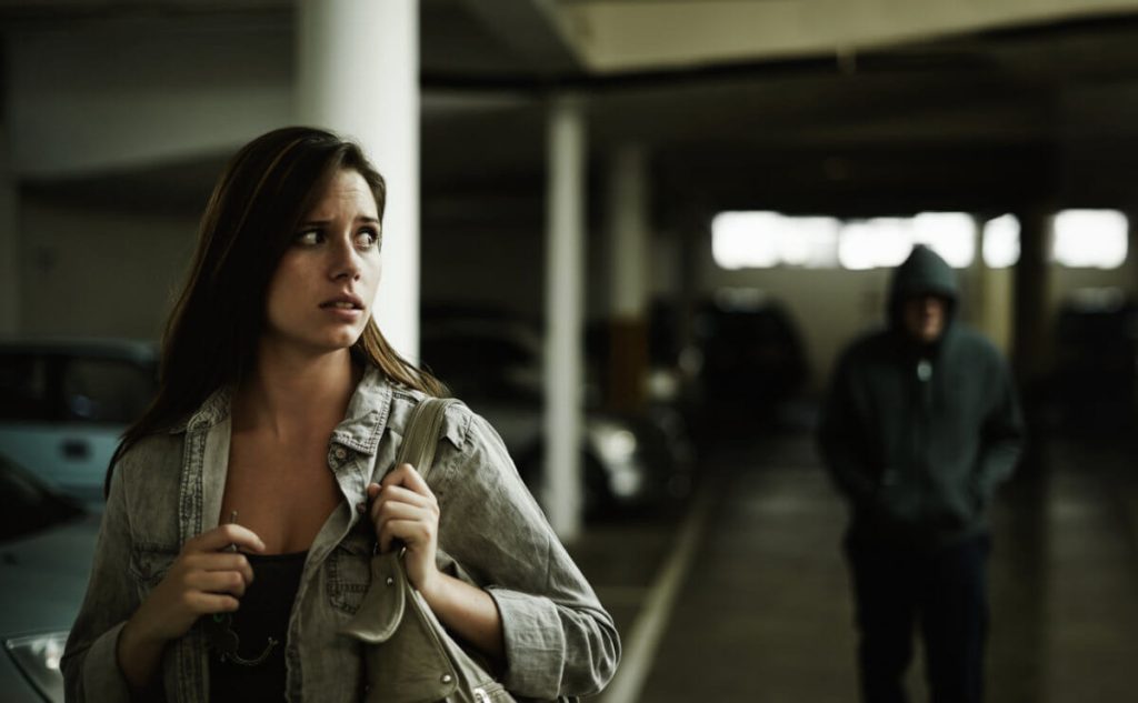 unsafe parking garage woman being followed 1200x742
